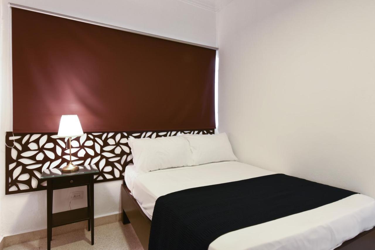 Ph 19 Guesthouse Hotel In Gazcue Santo Domingo Quarto foto